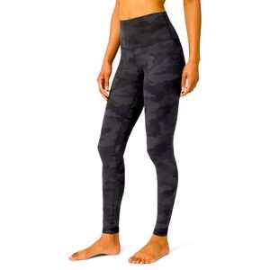 2 pairs of Lululemon Align Leggings. One green camo, one black camo. Both size 6